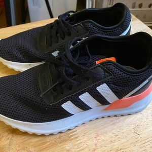 Black and coral adidas sneaker